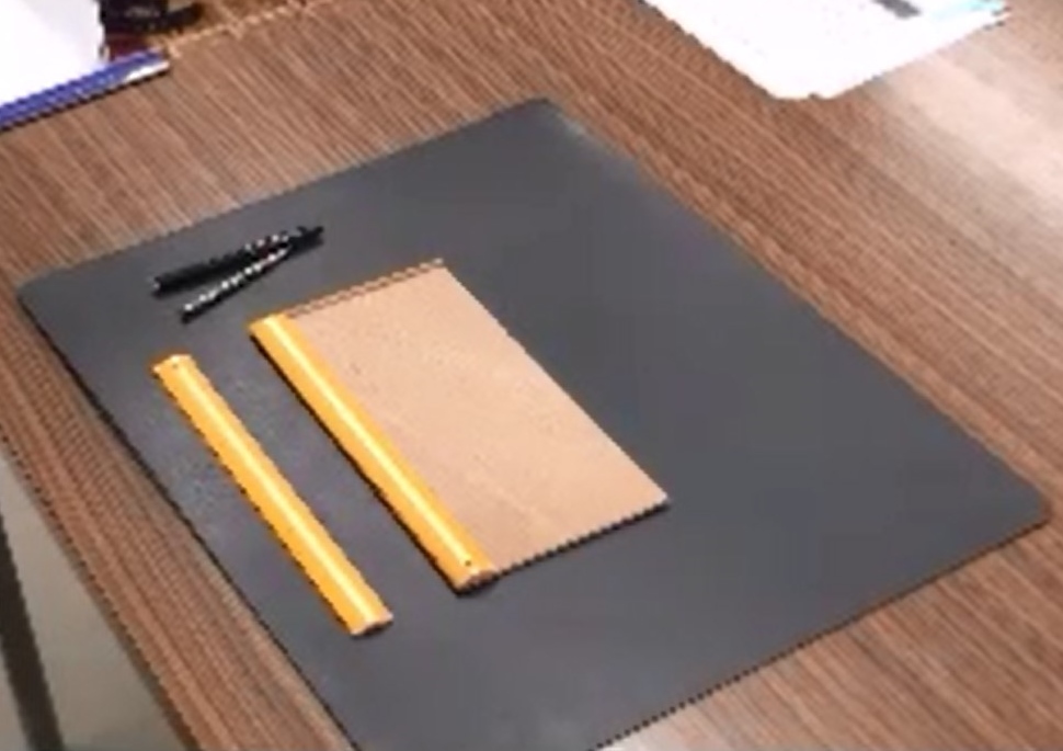A ruler setting board